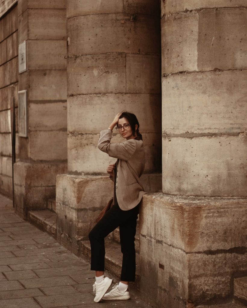 Girl in blazer and tailored trousers in Paris